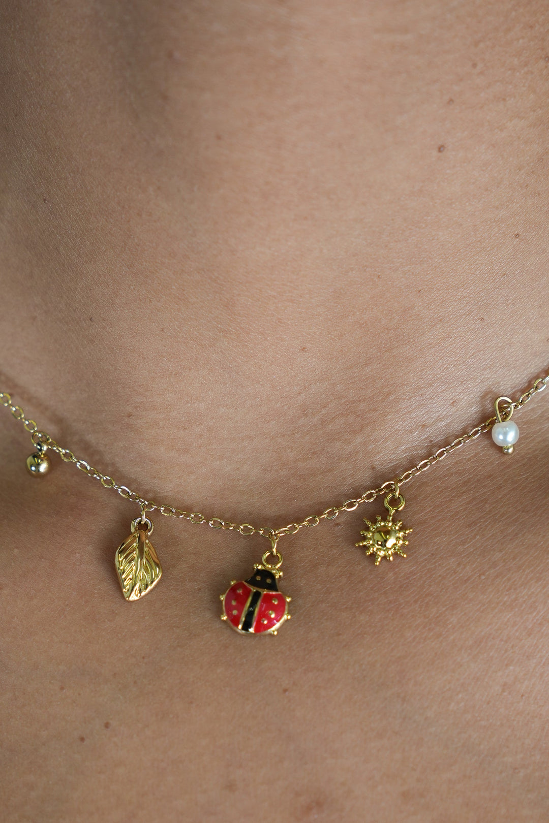 Ladybug and Pearl Necklace