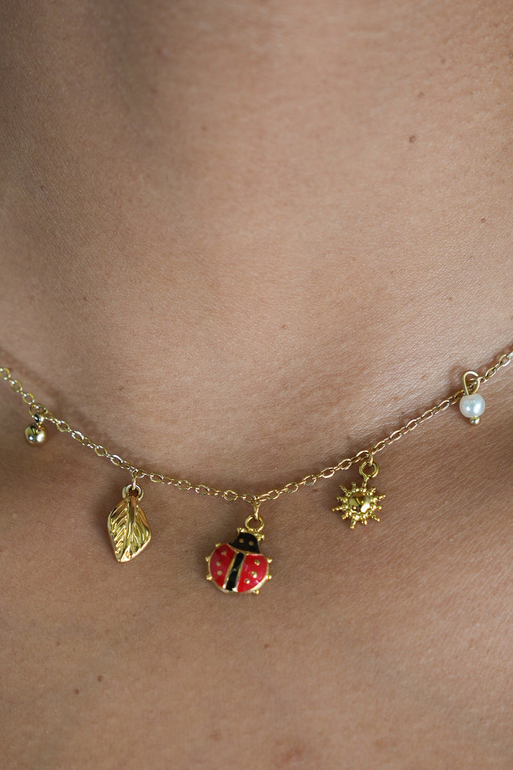 Ladybug and Pearl Necklace