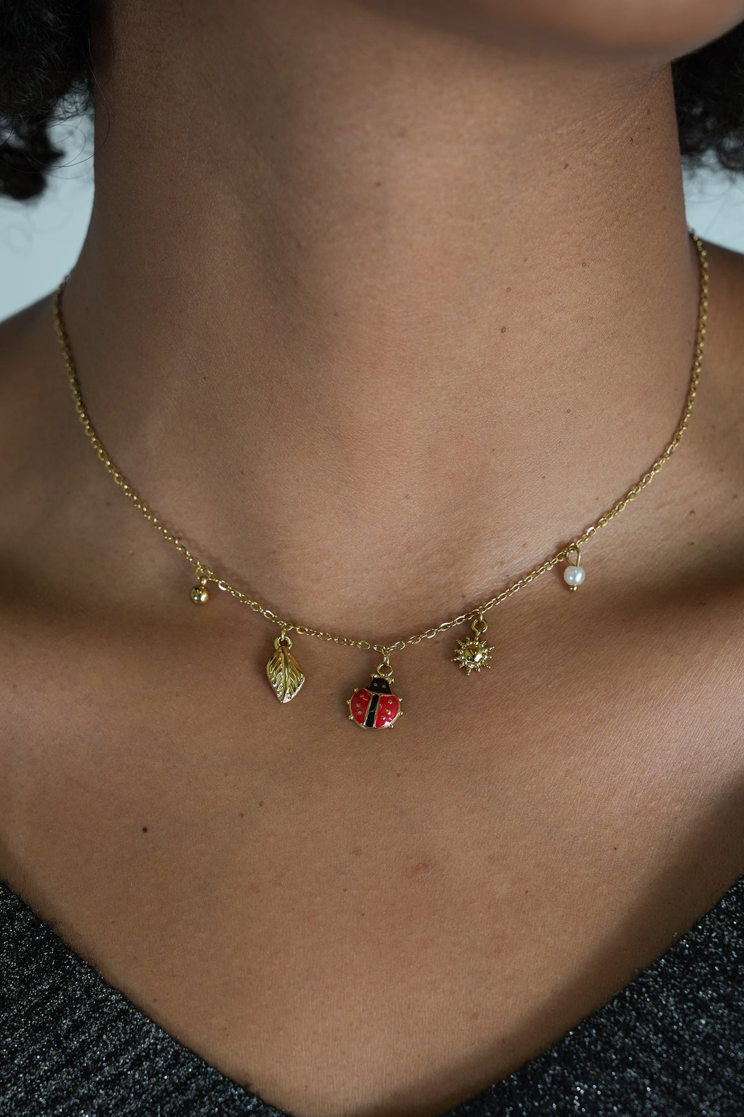 Ladybug and Pearl Necklace