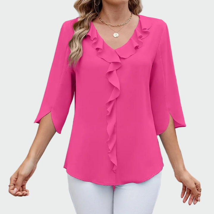 Elegant, sophisticated, and universal blouse