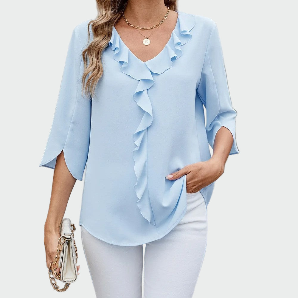 Elegant, sophisticated, and universal blouse